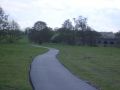 Image Halesworth Millennium Green cycle track. With the final layer of Tarmac, the track gets very close to being completed.